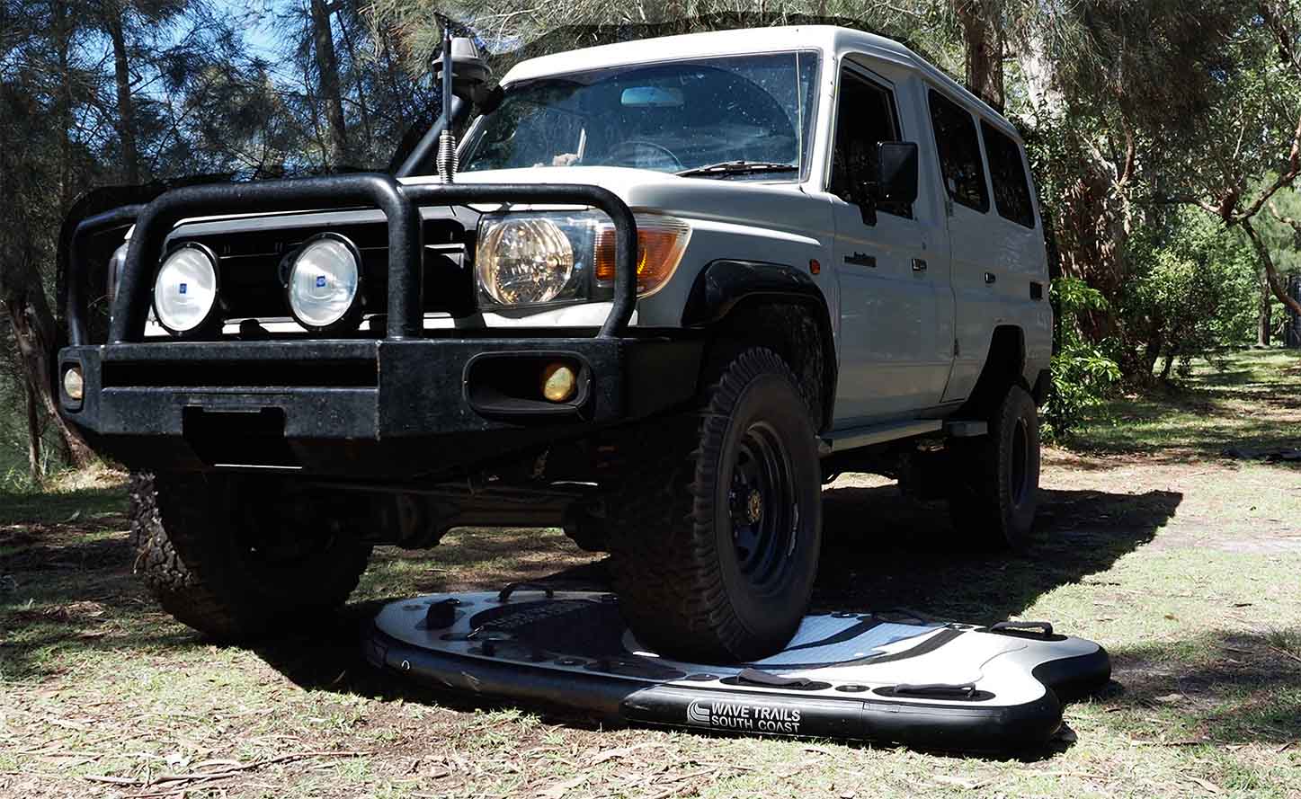 Car Driving Over Jet Ski Sled